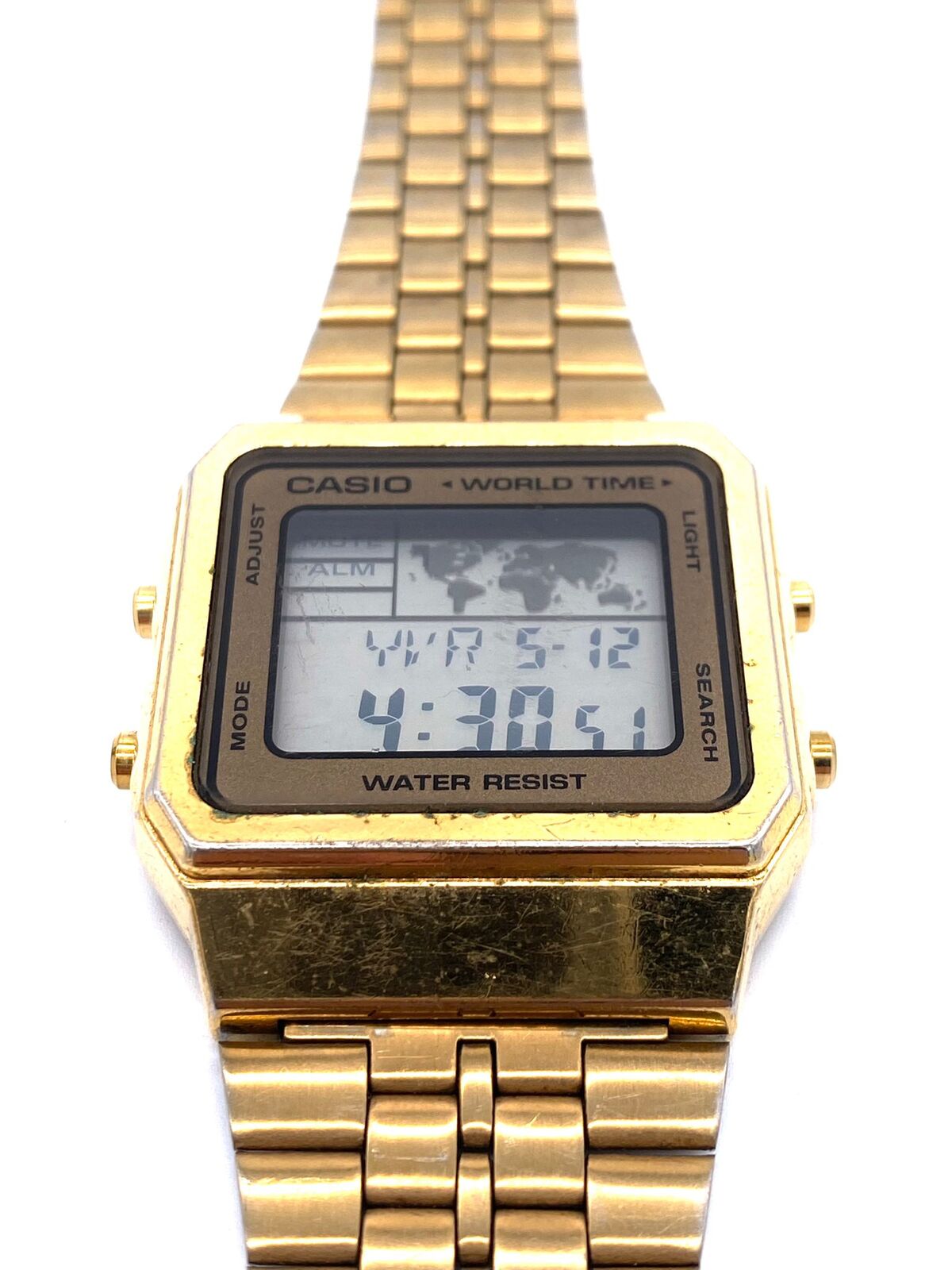 Gold casio world cheap time