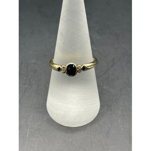 Ladies 9ct Yellow Gold Dark Blue Gemstone Ring