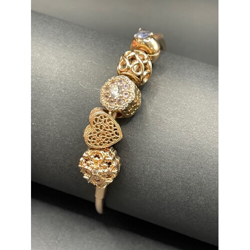 Ladies Rose Gold Plated Round Charm Bangle