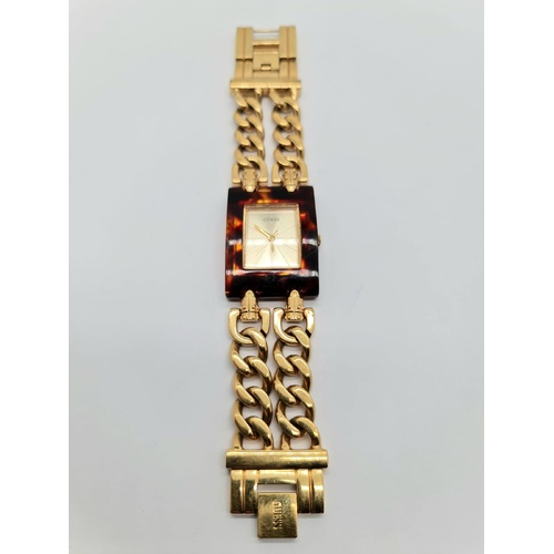 Guess Ladies Gold Tone Tortoise Analog Quartz Watch